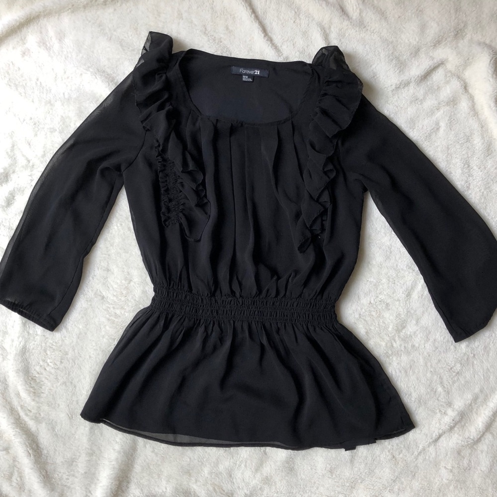 Black ruffled blouse